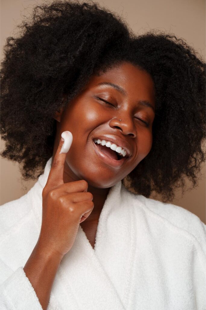 portrait woman doing her beauty regimen skincare routine (1)